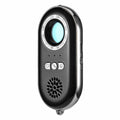 Compact black wireless signal detector with vibration alarm for anti-theft security.