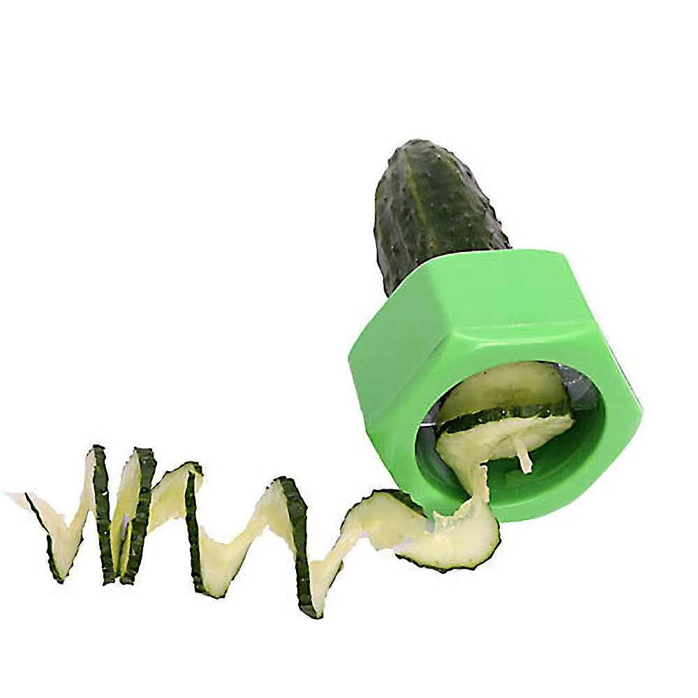 Yellow and green plastic spiral vegetable cutter for slicing cucumbers on a kitchen worktop.
