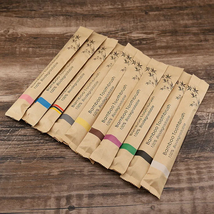 10 natural bamboo toothbrushes with charcoal bristles in white yellow purple grey green black colours