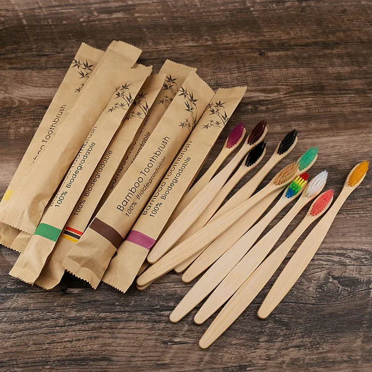 10 natural bamboo toothbrushes with charcoal bristles in white yellow purple grey green black colours