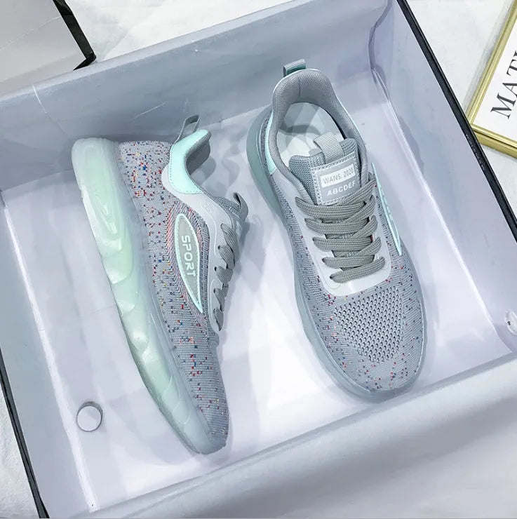 Women's casual running shoes with flying fabric upper and rubber sole in multiple colours