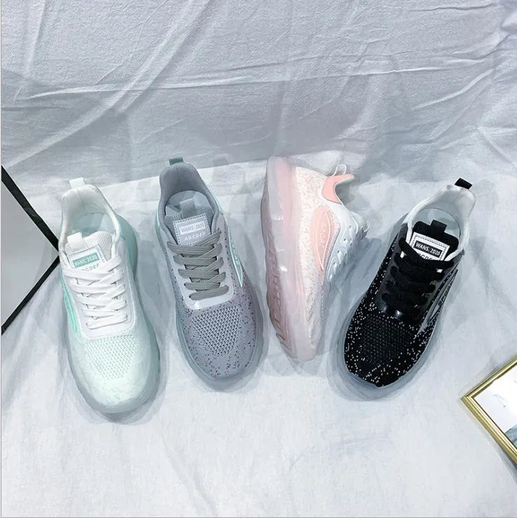 Women's casual running shoes with flying fabric upper and rubber sole in multiple colours