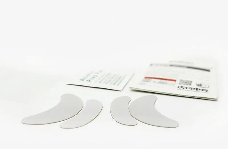 White Razer Juggern arc edge mouse skate replacements for Logitech GPX Superlight and GPW 2 mice with anti-static tweezers.