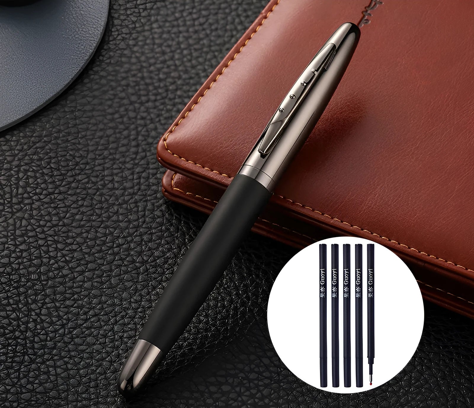 Heavy metal signature pen with non-slip grip and blue ink refill on a desk surface