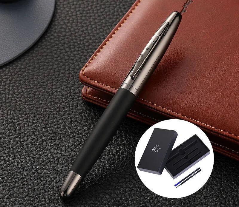 Heavy metal signature pen with non-slip grip and blue ink refill on a desk surface