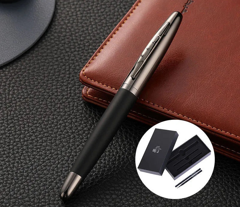 Heavy metal signature pen with non-slip grip and blue ink refill on a desk surface