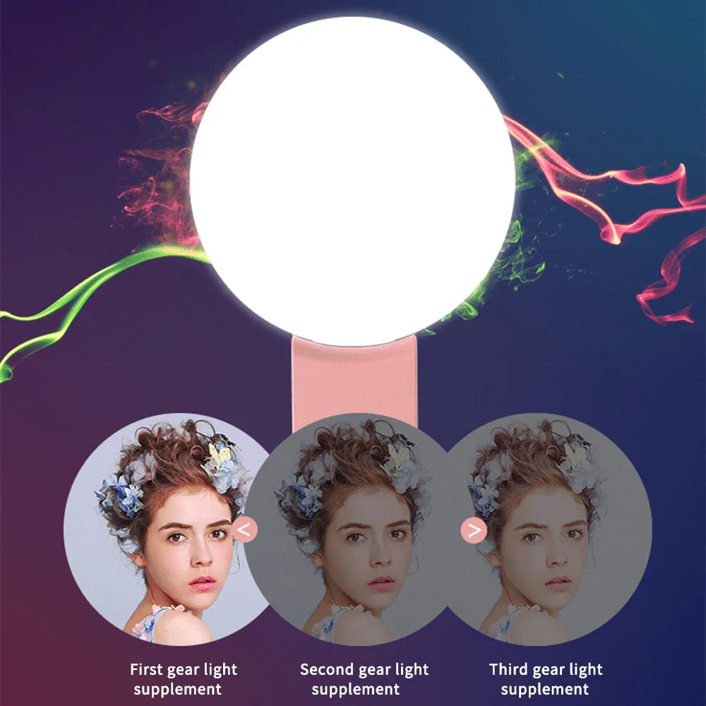 Round LED mini fill light for mobile phone selfies with clip attachment in multiple colours