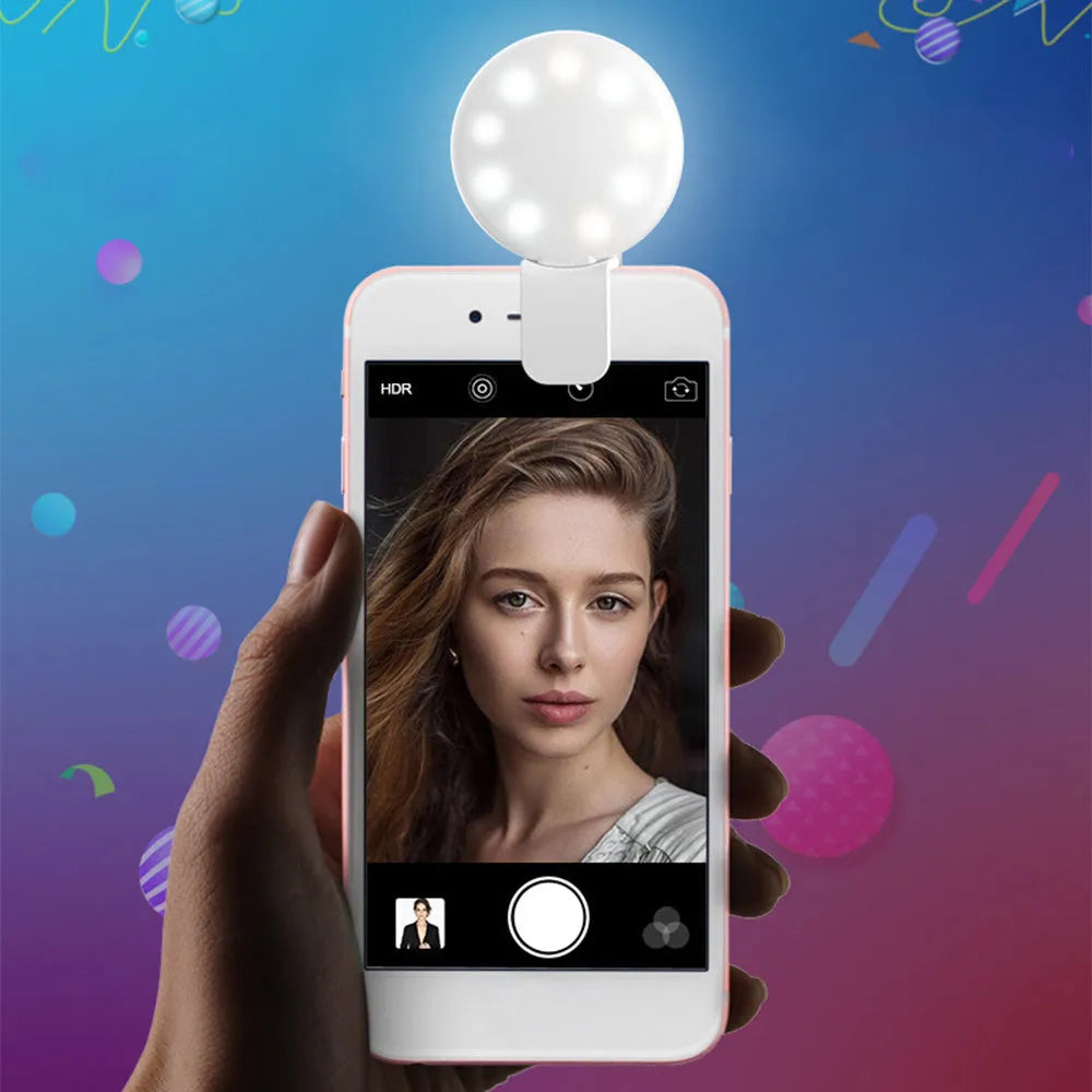 Round LED mini fill light for mobile phone selfies with clip attachment in multiple colours