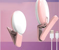 Round LED mini fill light for mobile phone selfies with clip attachment in multiple colours
