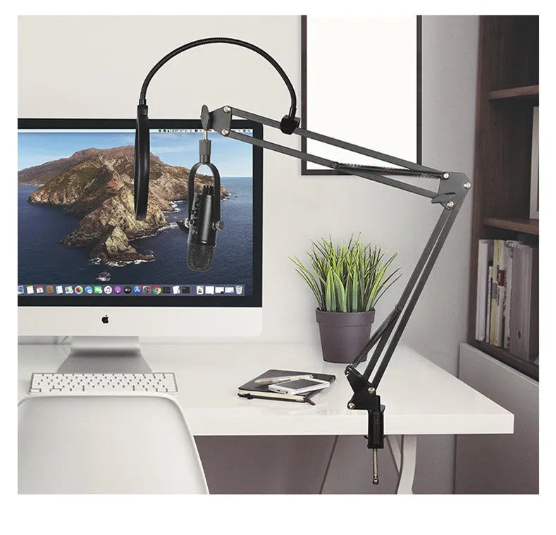 Black BM-86PRO USB condenser microphone on a metal stand with foam windscreen attached
