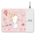 Cartoon-style wireless charging mouse pad with glowing RGB lights on a desk