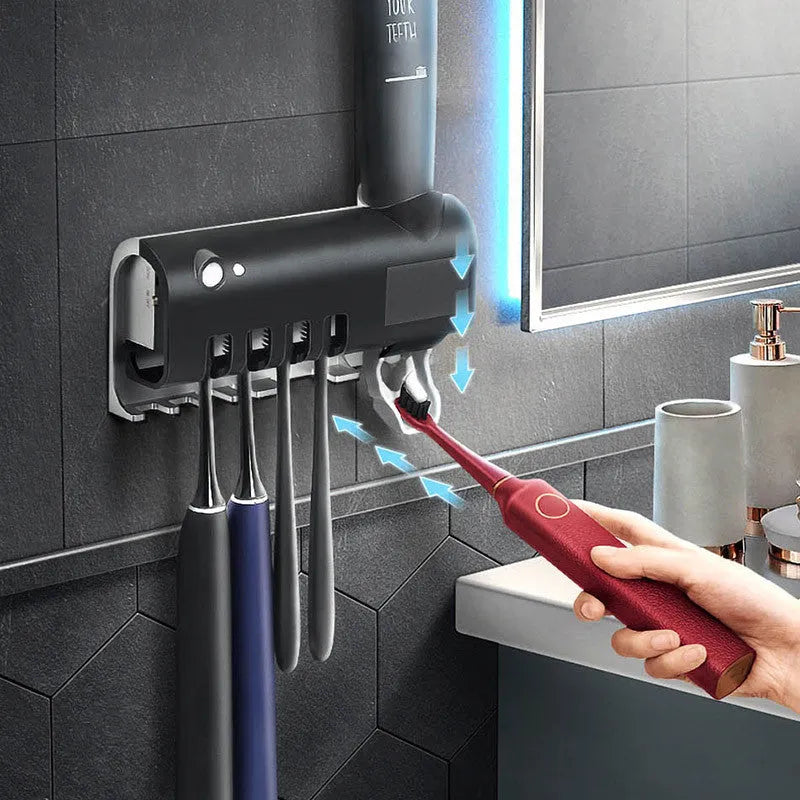 Smart UV toothbrush steriliser with automatic toothpaste squeezer in wall-mounted white design