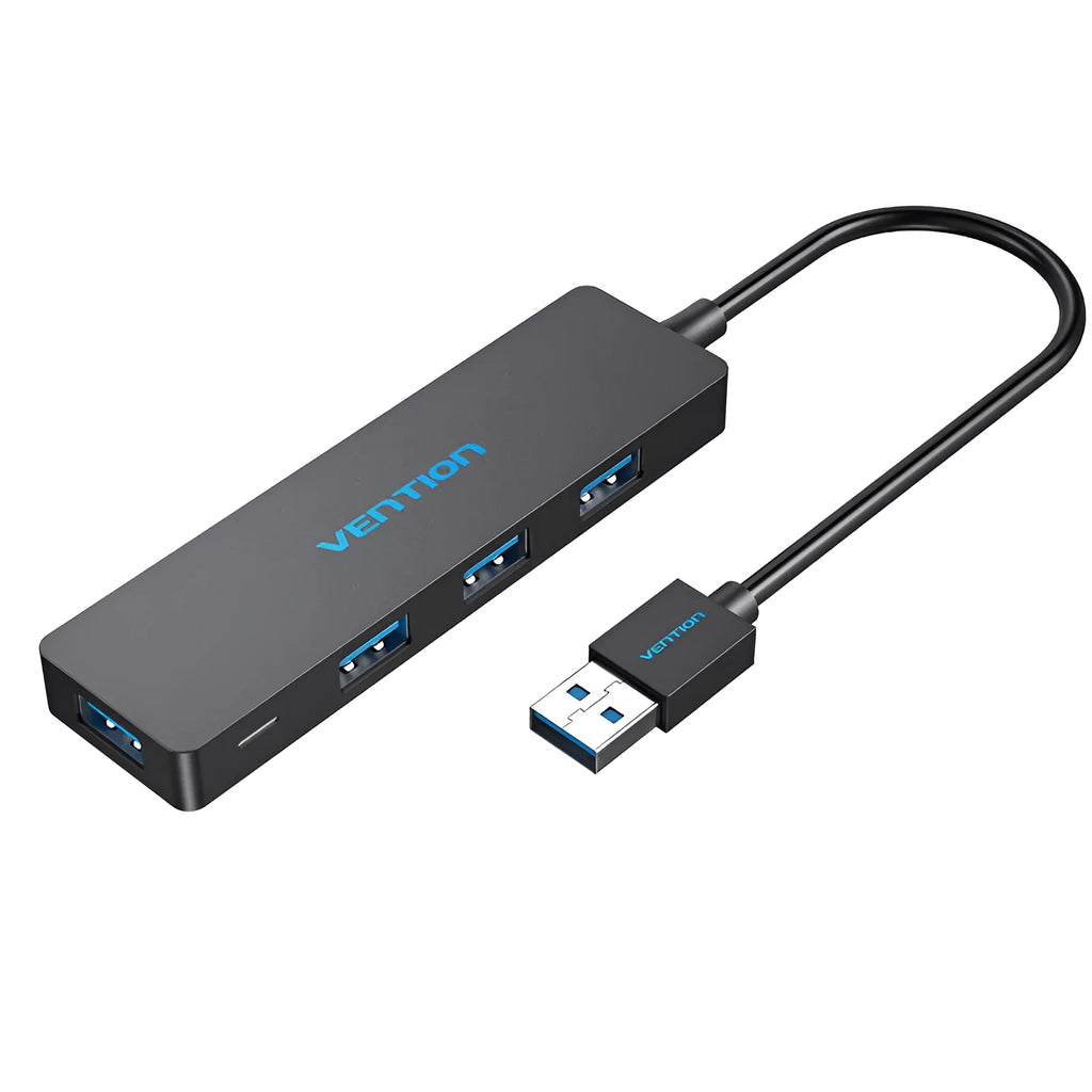 Black four-port USB 3.0 hub with a short cable, nickel-plated ports, and ABS plastic body on a desk