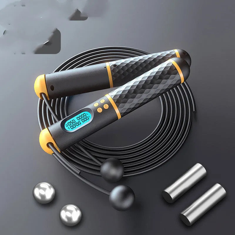 Intelligent counting skipping rope with ABS handle and weight-bearing balls on black yellow background
