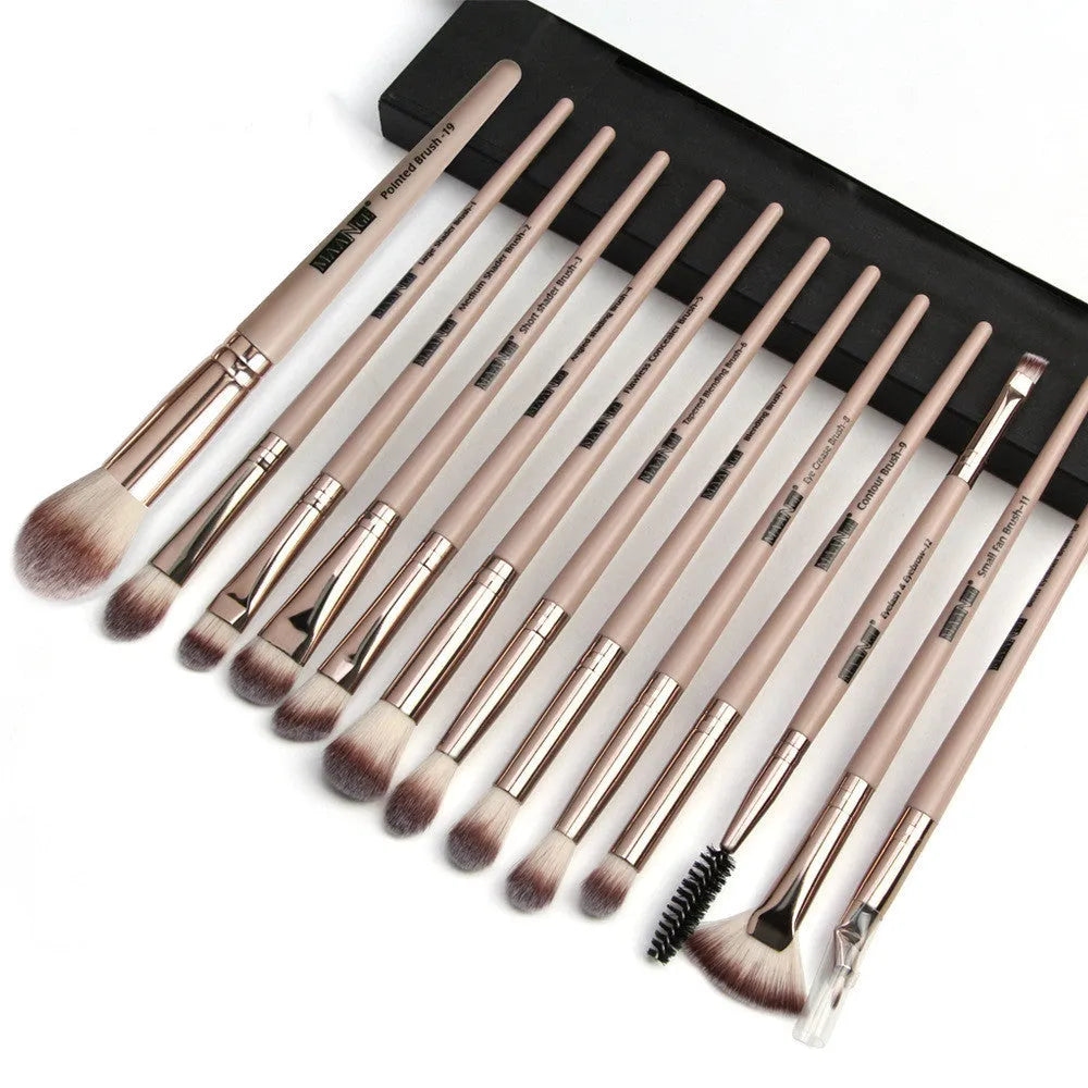 13 piece eye makeup brush set with corrugated silk nylon bristles and portable plastic handles in rose gold colour