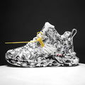 Men's high-top basketball shoes in a camouflage pattern with a rubber sole.