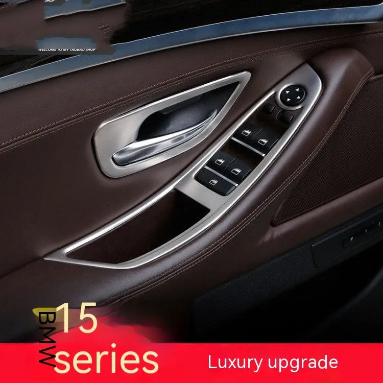 Four black interior handle decorative strips for BMW 5 Series F10/F11 models with stainless steel trim detailing