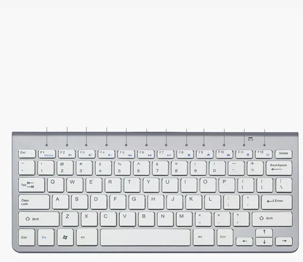 Wireless keyboard and mouse set with slim 10mm keyboard in gold colour on white background