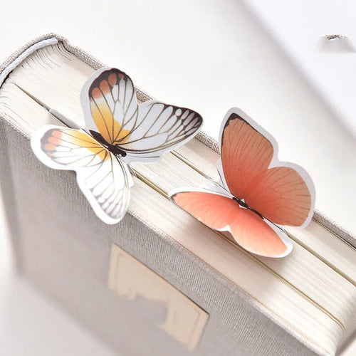 Butterfly-shaped paper bookmark with random colour design for gifting and stationery use.
