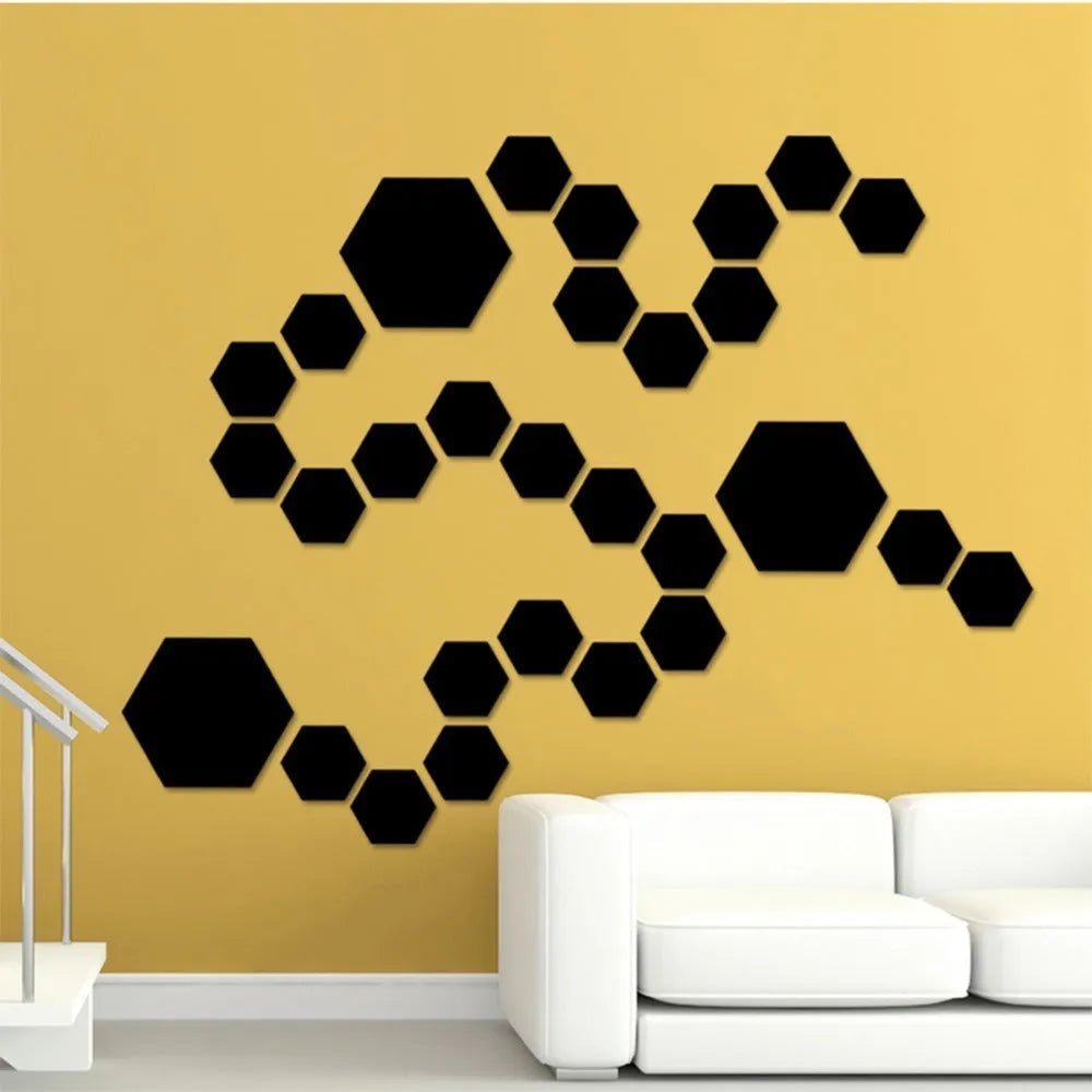 Hexagonal silver PS mirror wall sticker on a wall surface close up