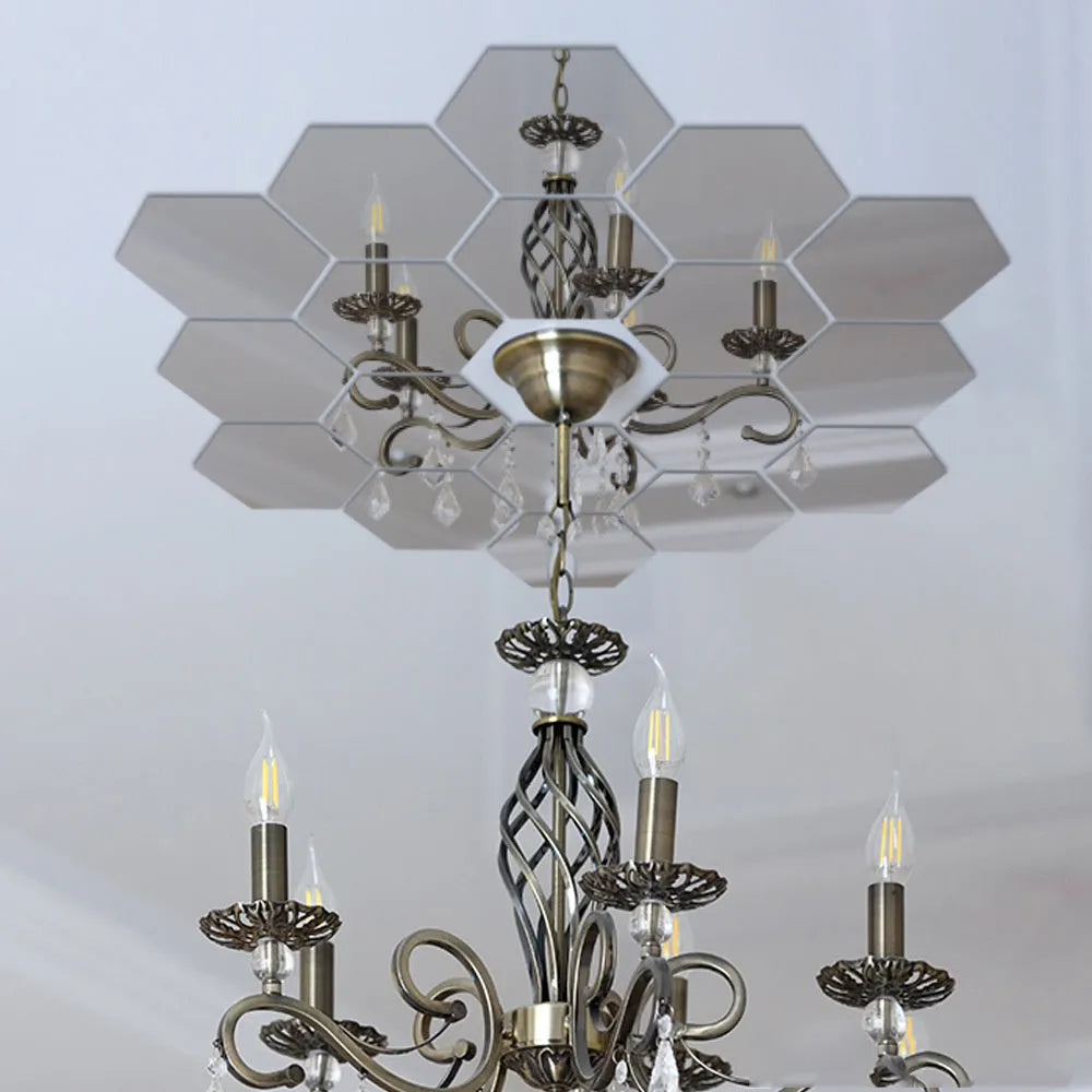 Hexagonal silver PS mirror wall sticker on a wall surface close up