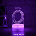 3D LED night light showing a glowing, laser-engraved diamond ring design on a black background.
