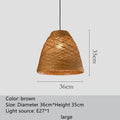 Rattan woven ball pendant lamp with adjustable cord hanging from ceiling