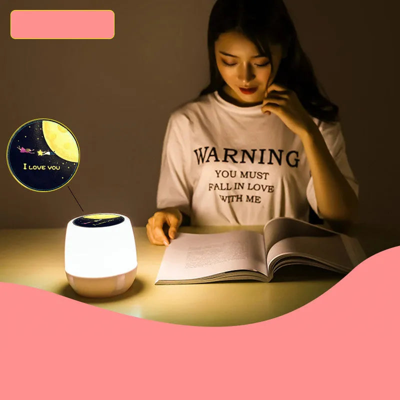 Pruixin rotating projector night light displaying star patterns on a bedroom ceiling.