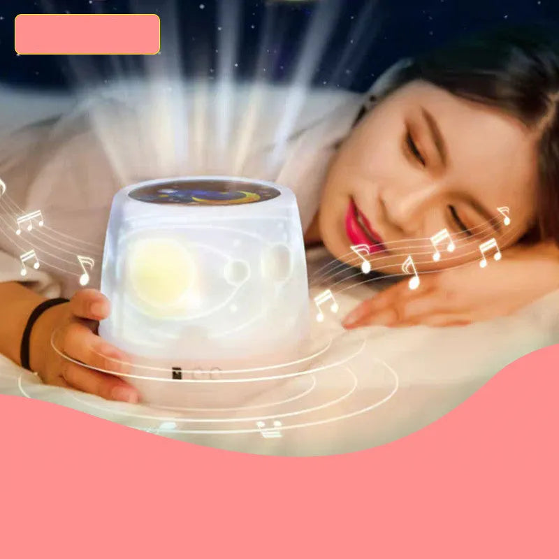 Pruixin rotating projector night light displaying star patterns on a bedroom wall.