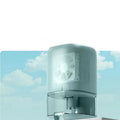 Portable white dehumidifier unit with a 0.7L water tank and UK power plug on a wooden floor.