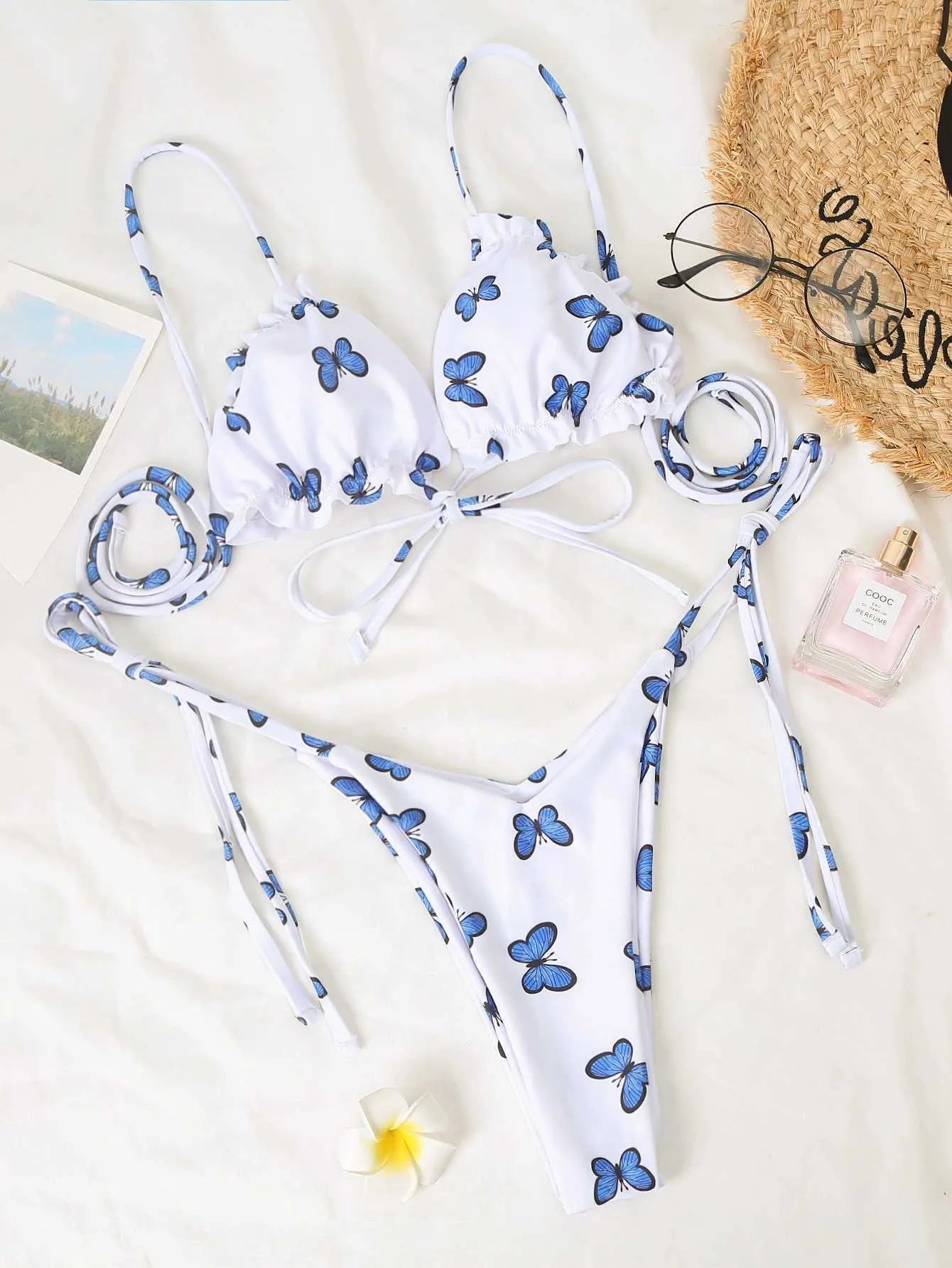 White butterfly print lace thong bikini set with underwire support for women
