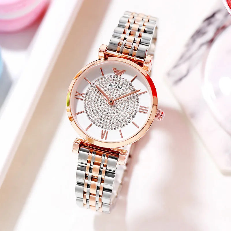 Rose gold gypsophila quartz watch set with 32mm dial, alloy strap, and matching titanium steel heart-shaped necklace