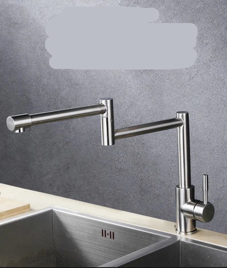 Silver stainless steel kitchen mixer tap with dual lever controls and rotating spout