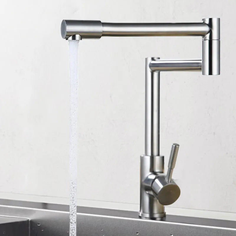 Silver stainless steel kitchen mixer tap with dual lever controls and rotating spout