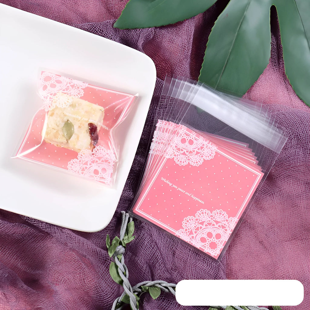 Pink self-adhesive plastic packaging bags with UV printing, shown sealed and open, next to a bar of soap.