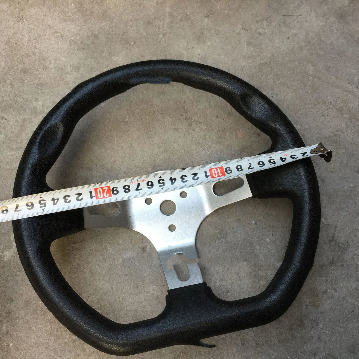 SL 27 cm black steering wheel for four-wheel karting, shown as a kart steering component