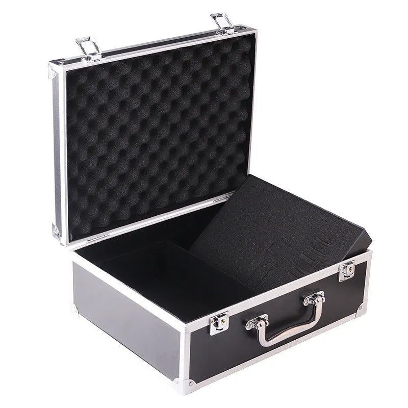 Black aluminium tattoo equipment storage case with open lid showing foam compartments for needles and bottles.