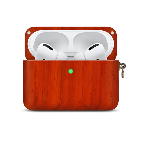 Hardwood Bluetooth earphone sleeve in a choice of wood types next to wireless earphones.