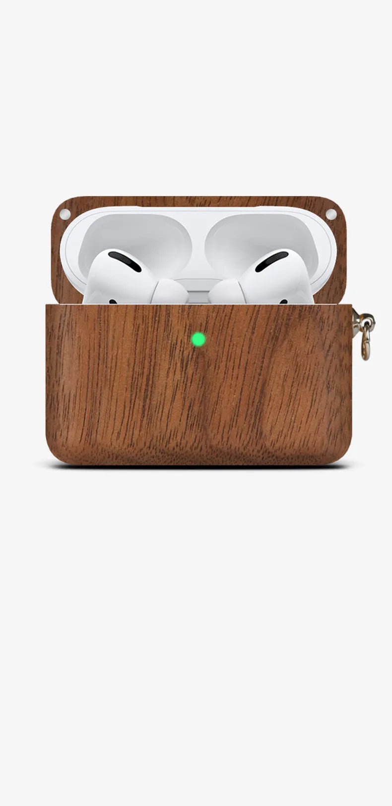 Solid walnut and bamboo wood sleeves for Bluetooth earphones on a wooden table.