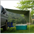 Green Unity car side awning set up next to a vehicle, showing the 2.8m x 1.8m double tent structure