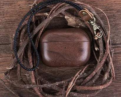 Solid wood protective sleeve for AirPods case with leather hand strap in walnut finish