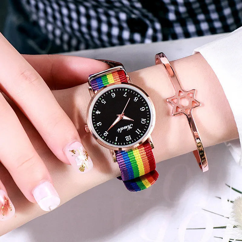 Ladies luminous starry sky watch with round 36mm dial and rainbow nylon canvas strap, pin buckle closure