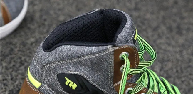 Black Tiger Boots motorcycle casual shoes with mesh panels and reinforced heel on a motorcycle footpeg.