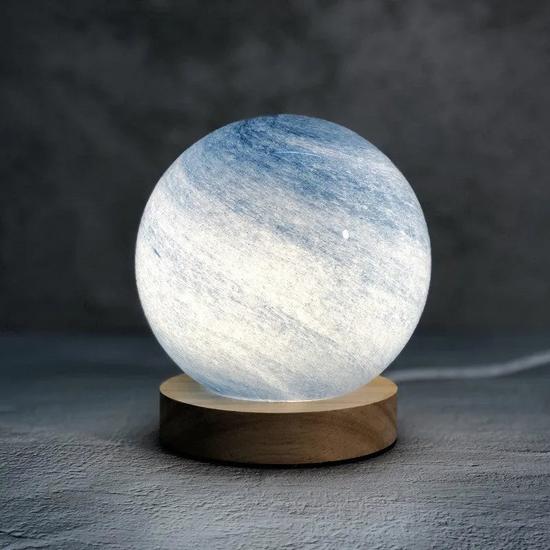 Girl Heart Nordic style glass table lamp in chosen colour with USB cable and button switch on bedside table.