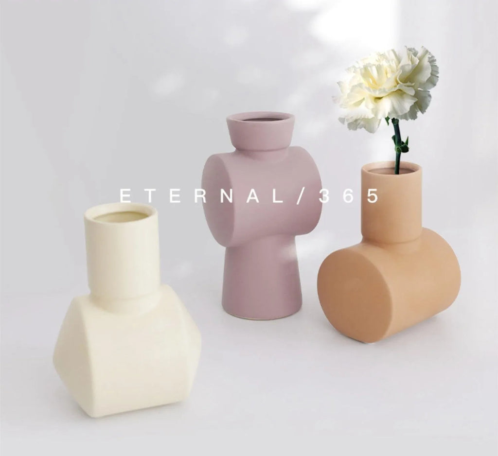 Nordic Morandi style hammer ceramic vase in beige, brown, or purple, 18cm tall.