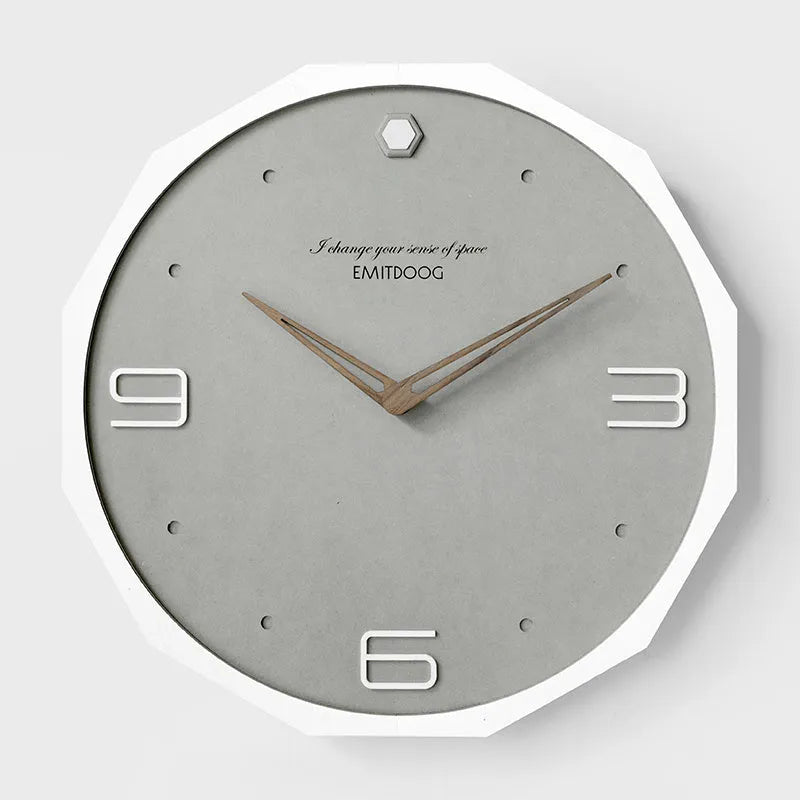 Nordic style round 12 inch wall clock with perforated pattern in neutral colours