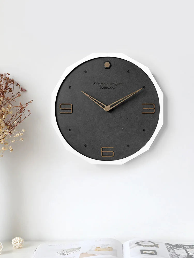 Nordic style 12-inch round wall clock with perforated minimalist design in Geralt construction