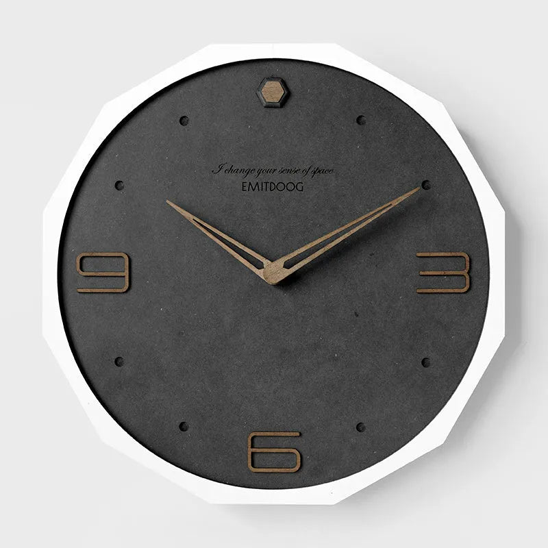 Nordic style 12-inch round wall clock with perforated minimalist design in Geralt construction