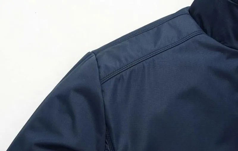 Men's blue polyester casual jacket with stand-up collar and zip front, extra-wide fit, front view.