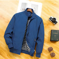 Men's blue polyester casual jacket with stand-up collar and zip front, extra-wide fit, front view.